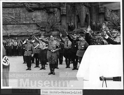 Adolf Hitler in front of Leipzig's Völkerschlachtdenkmal (Monument to the Battle of the Nations) during the Horst Wessel Lied (anthem of the NSDAP)